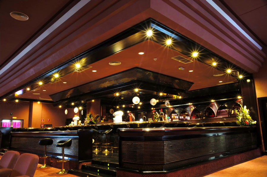 View of a bar counter with bar stools