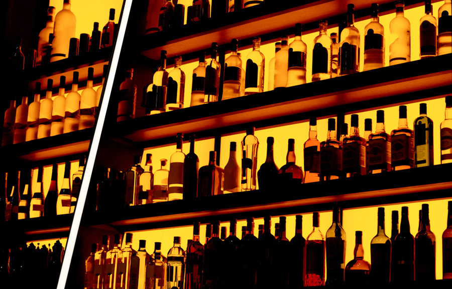 View of liquors bottle on a shelf in a bar