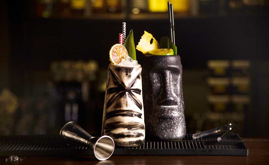 View of a tiki cocktail on a bar counter