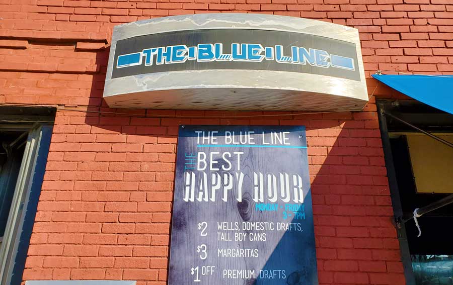 The Blue Line on signage outside the bar